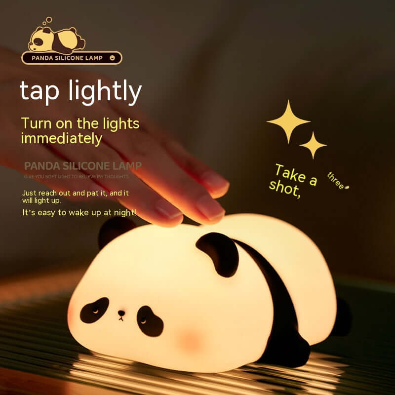 Cute panda silicone lamp being tapped to turn on, perfect for children's night lighting and bedroom decor.