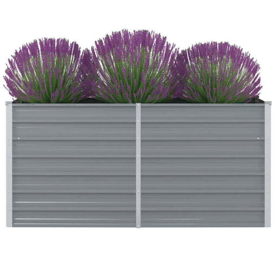 Galvanized steel raised garden bed with purple flowers for patio and outdoor space furniture.