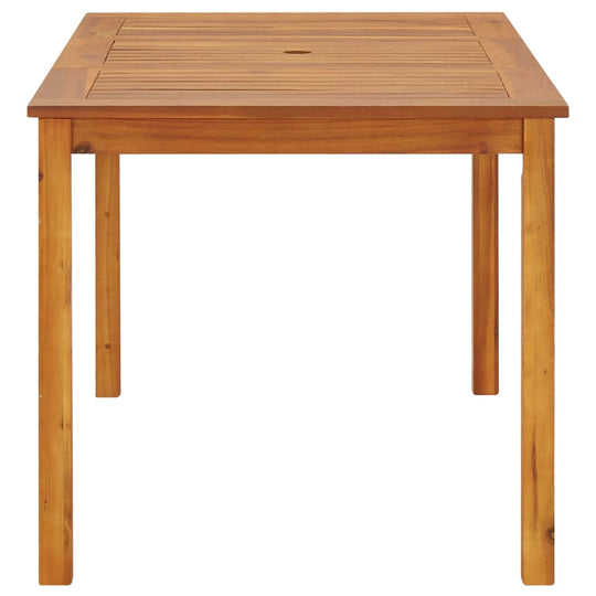 Solid acacia wood garden table with slatted top, perfect for outdoor dining and furniture arrangements.