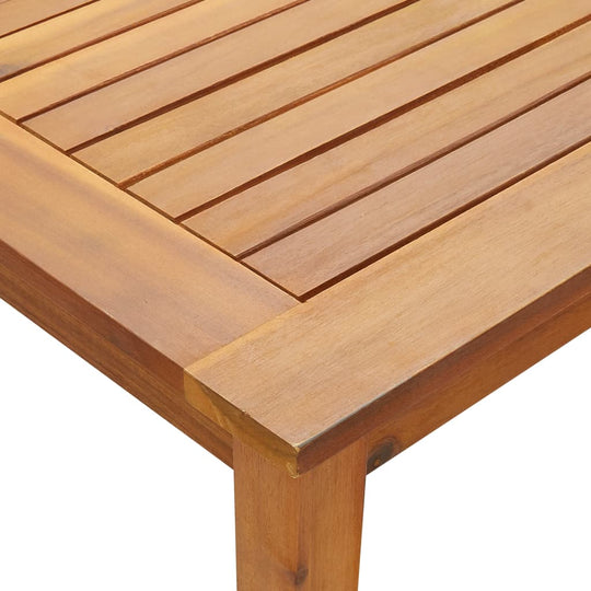 Close-up of solid acacia wood garden table surface, showcasing slatted design and rich wood grain texture. Perfect for outdoor furniture.