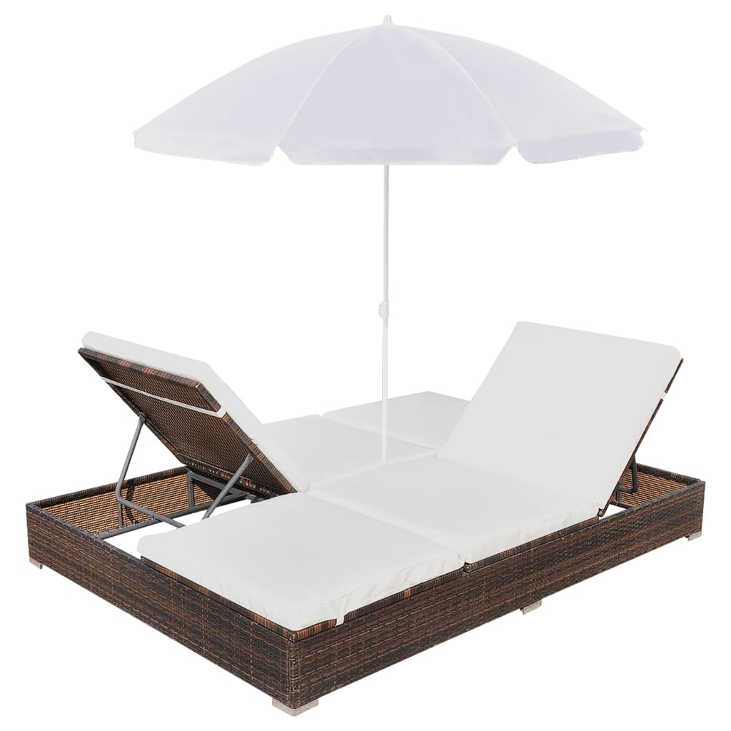 Outdoor lounge bed with adjustable positions and umbrella, made of weather-resistant poly rattan for patio or garden furniture set.