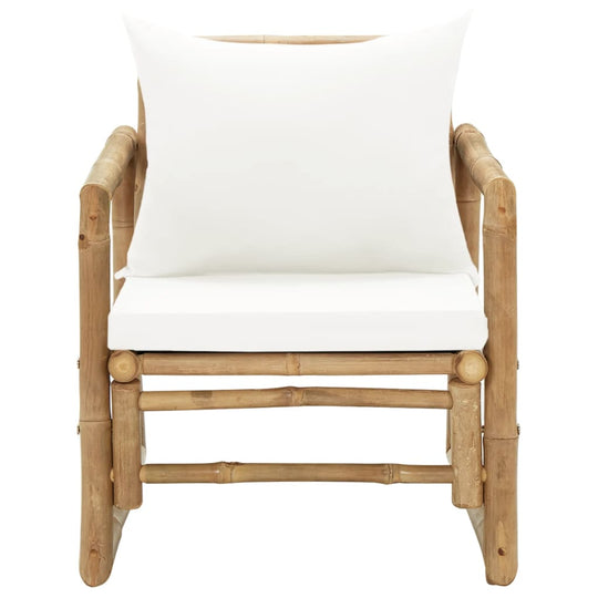 Bamboo garden chair with white cushion, perfect for outdoor lounge furniture in a stylish patio setting.