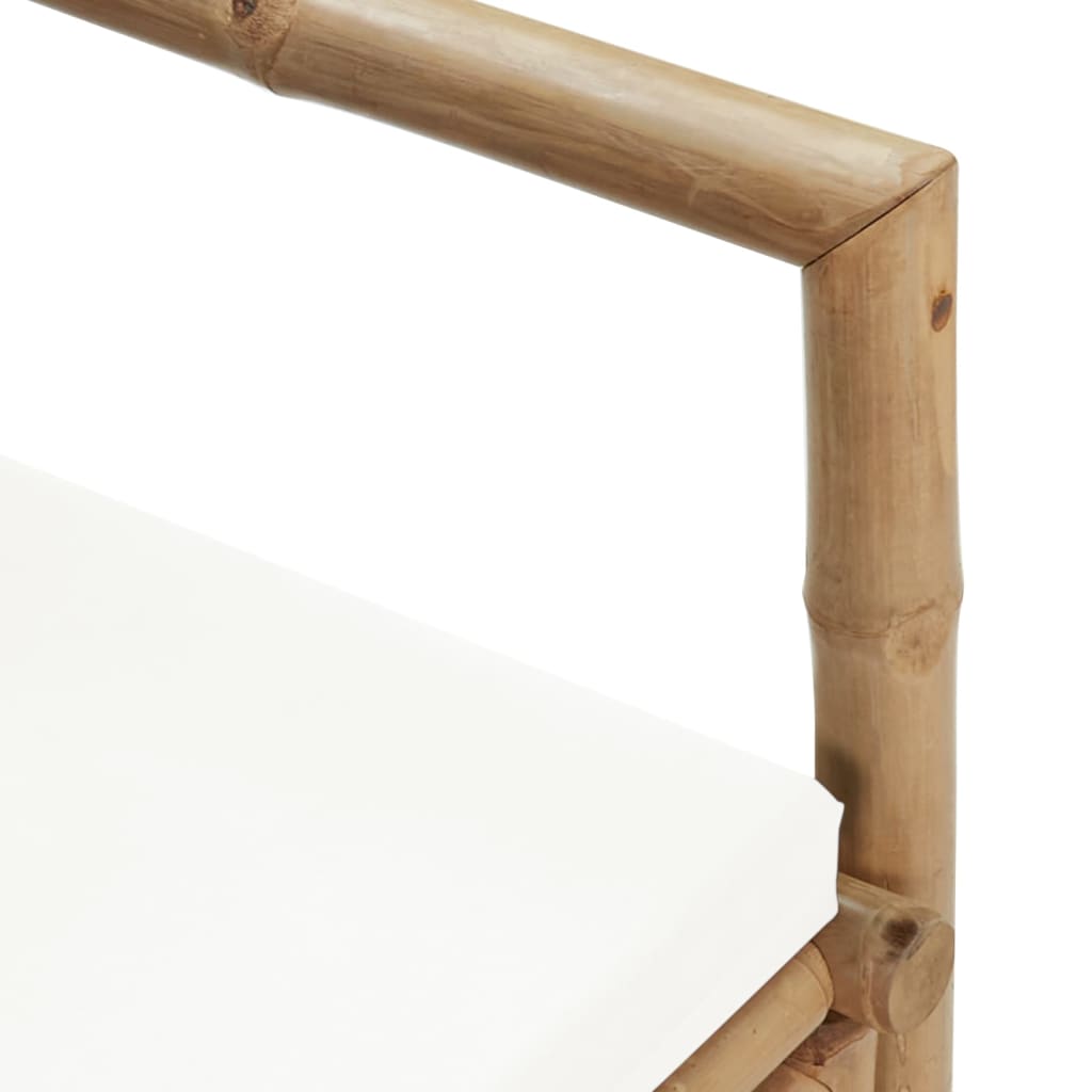 Close-up of bamboo garden chair arm and cushion showcasing outdoor furniture design and weather-resistance features.