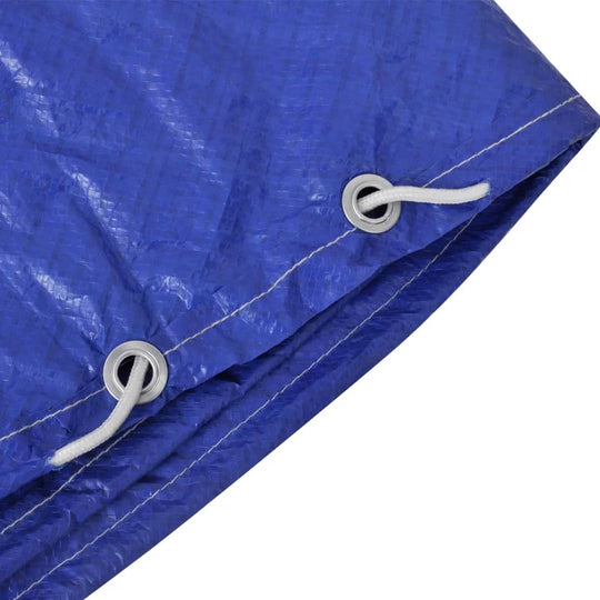 Close-up of blue polyethylene pool cover featuring reinforced grommets and drawstrings for secure fastening.