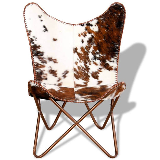 Vintage brown and white butterfly chair made of real cowhide leather, designed for comfort and style.