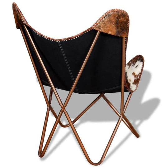 Vintage butterfly chair in brown and white cowhide leather with a metal frame, showcasing a stylish rear view.