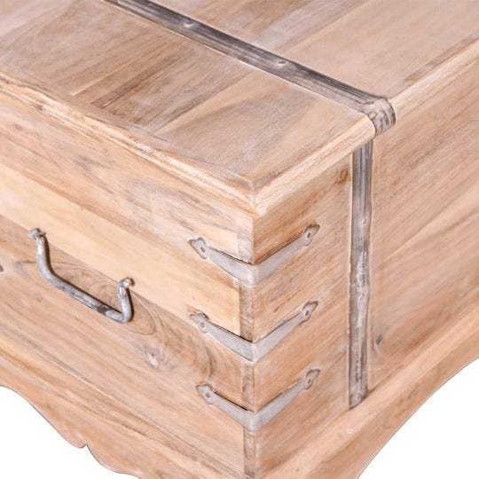 Close-up of acacia wood storage chest with silver metal accents and side handle, showcasing its rustic design and craftsmanship.