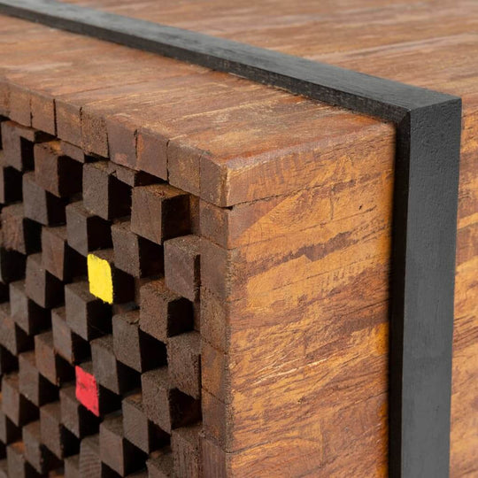 Close-up of a textured wooden side table featuring a unique pattern and black accents, ideal for modern outdoor furniture.