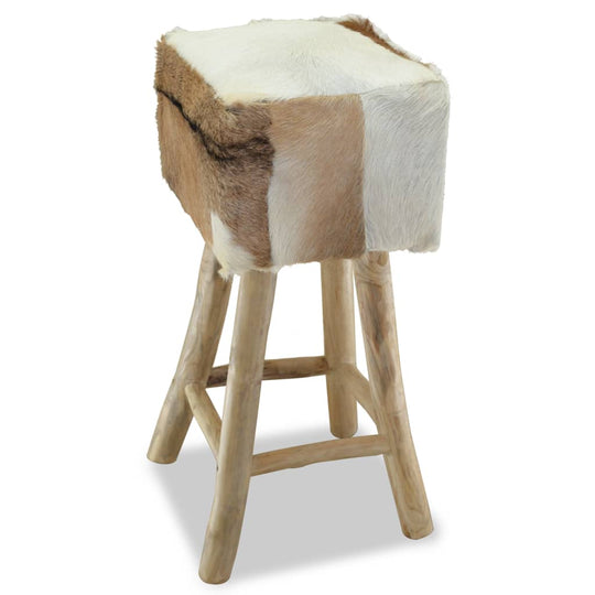 Stylish bar stool with cowhide seat and solid teak wood frame, perfect for rustic charm in homes and bars. مفروشات, أثاث.