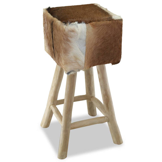 Stylish bar stool with goat leather seat and solid teak wood frame, perfect for restaurants or home decor, highlighting rustic charm.