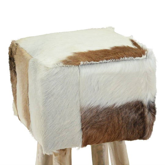 Bar stool upholstered in authentic goat leather with a patchwork design, featuring sturdy solid wood legs, ideal for rustic decor.