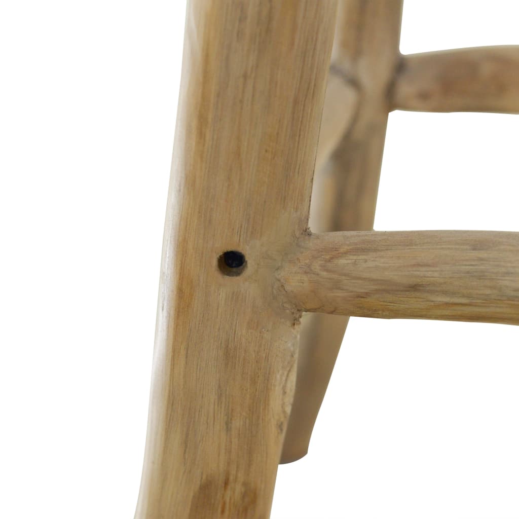 Close-up of solid teak wood frame on real leather bar stool, highlighting durability and rustic design.