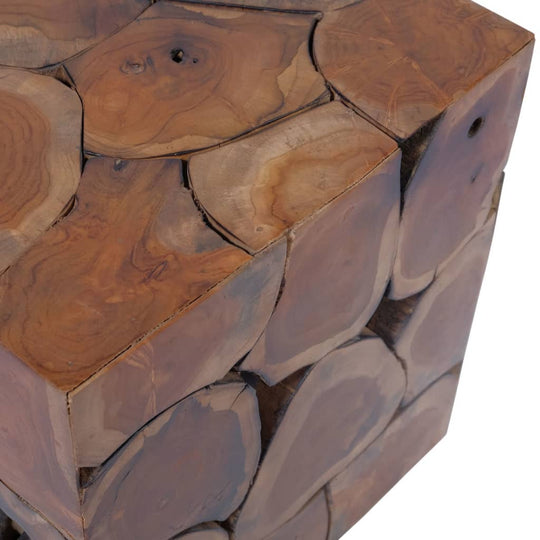 Close-up of a solid teak stool featuring natural wood grain patterns, ideal for outdoor furniture or patio settings.