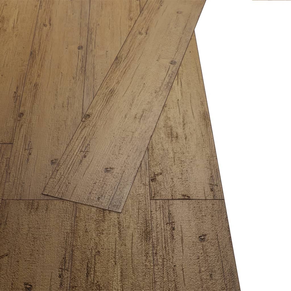 Self-adhesive PVC flooring planks in walnut brown, showcasing realistic wood texture and easy installation.