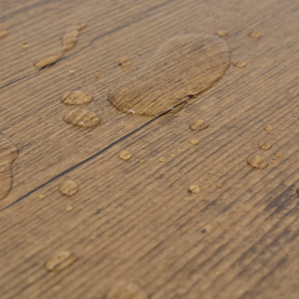 Water droplets on self-adhesive PVC flooring planks in walnut brown, showcasing durability and moisture resistance.