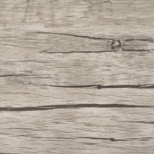 Close-up of self-adhesive PVC flooring planks in oak washed design with natural wood texture.