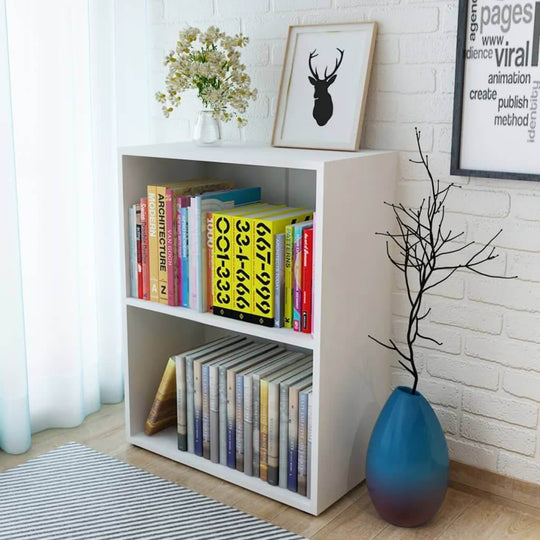 Modern white bookshelf with books, decorative items, and a plant in a stylish room setting. Suitable for any furniture decor.