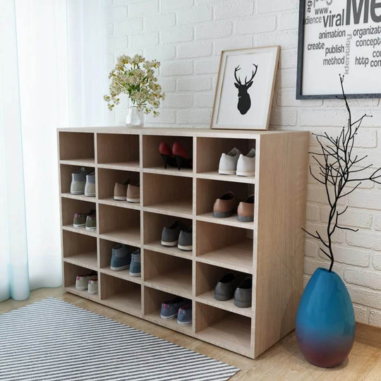 Shoe rack in oak finish with 20 compartments, organized shoes displayed in a stylish living space setting.