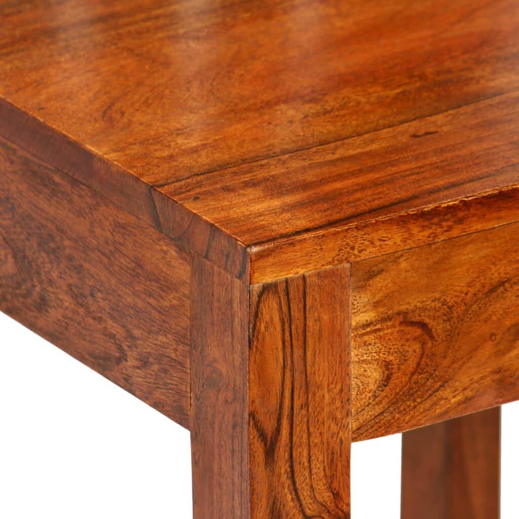 Close-up of solid acacia wood with honey finish, showcasing unique grain patterns for premium outdoor furniture.