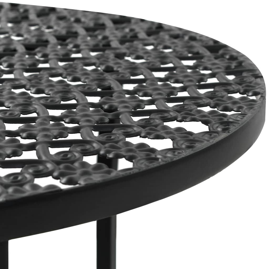 Close-up of the black metal bistro table's intricate, antique-style tabletop design, ideal for outdoor and indoor furniture.