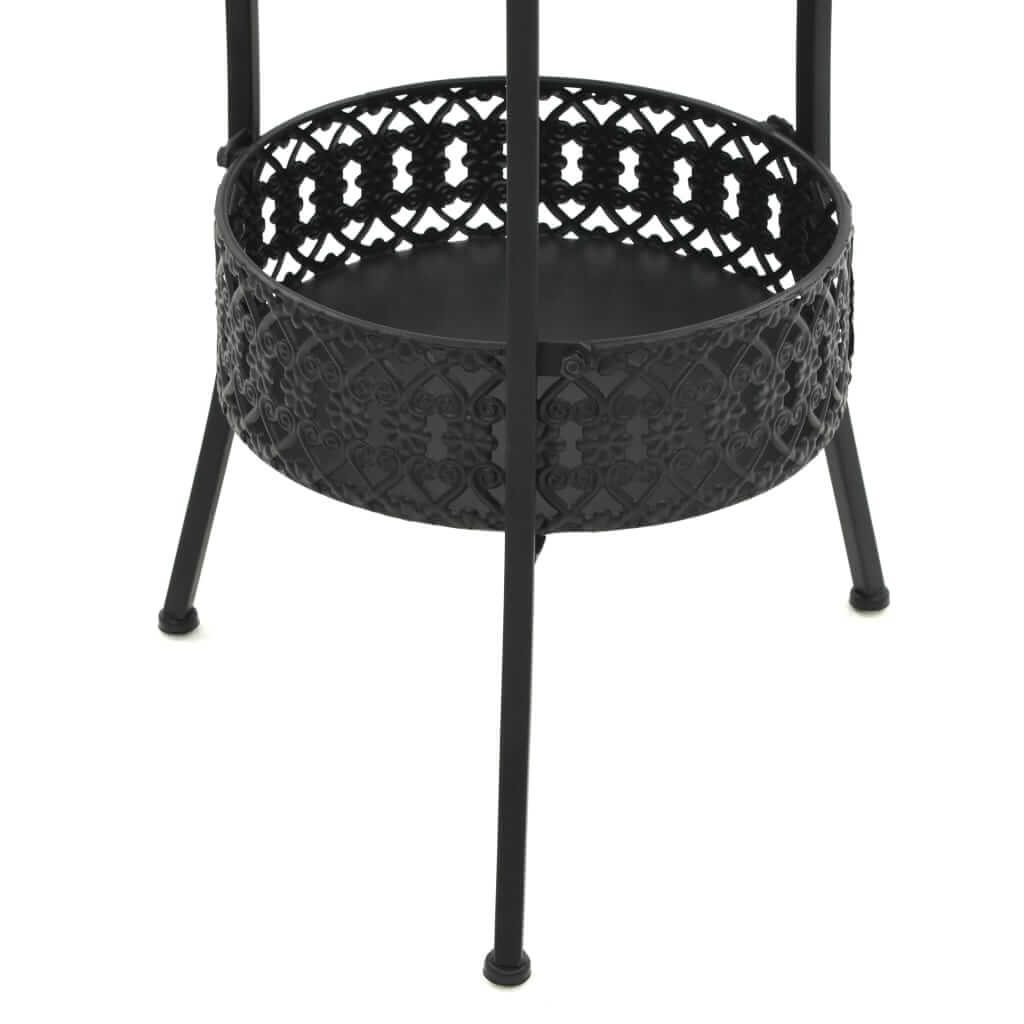 Black metal bistro table base with intricate detailing and bottom storage basket, ideal for furniture and outdoor settings.