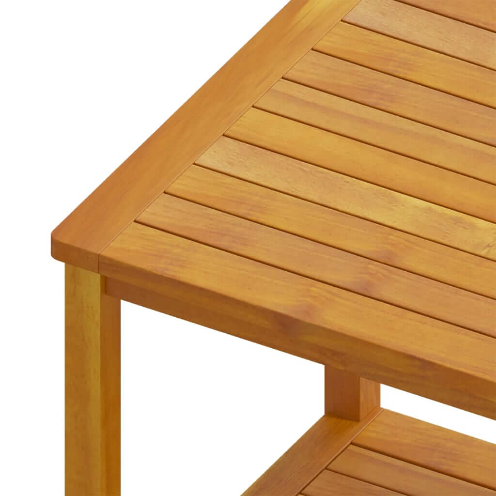 Close-up of solid acacia wood side table top, showcasing slatted design and sturdy construction. Ideal for indoor or outdoor use.