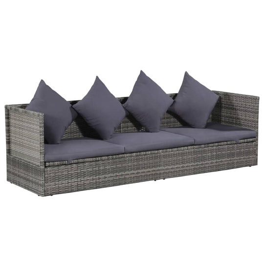 Grey poly rattan garden sofa with four cushions, perfect for stylish outdoor lounging and patio decor.