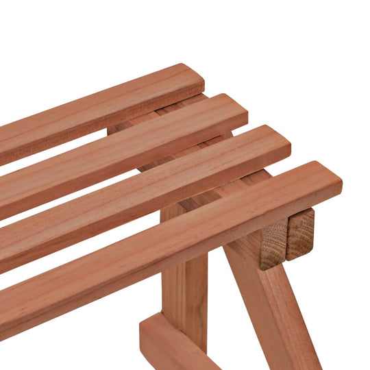 Close-up of a 3-tier cedar wood plant stand showcasing slatted design and sturdy construction for outdoor furniture display.