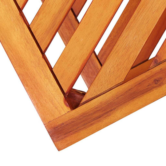 Close-up of solid acacia wood side table featuring a diagonal pattern, showcasing durable construction for outdoor furniture.