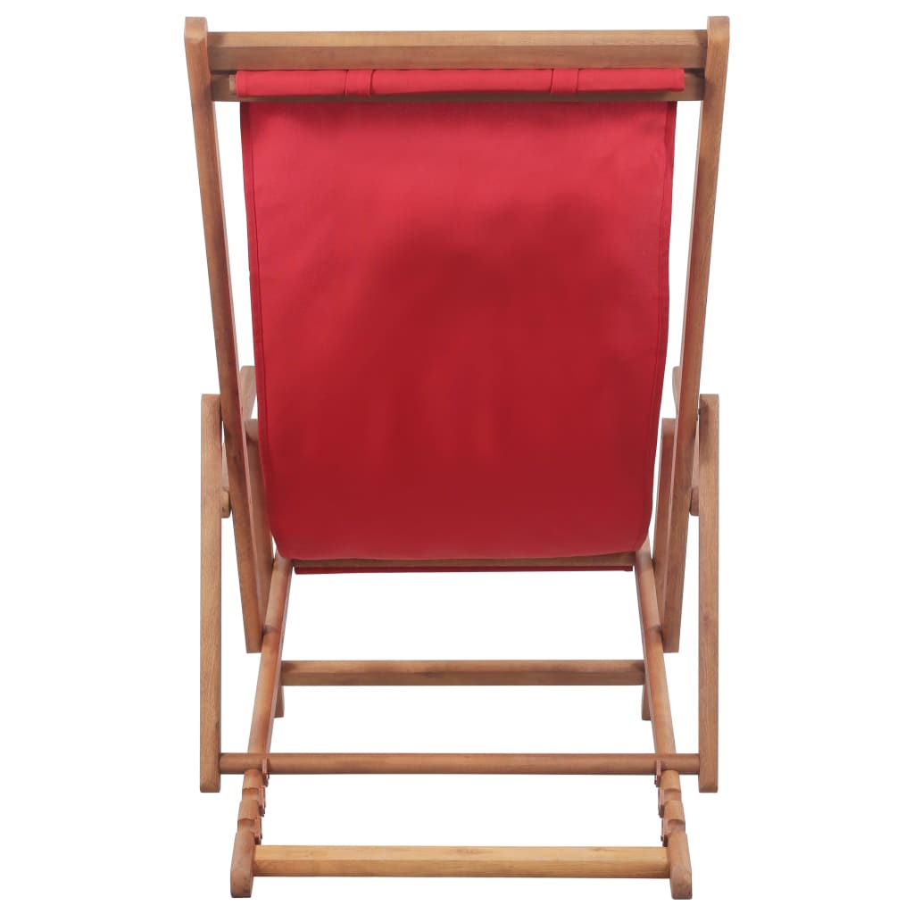 Comfortable folding beach chair with a red fabric seat and sturdy wooden frame, ideal for outdoor relaxation.