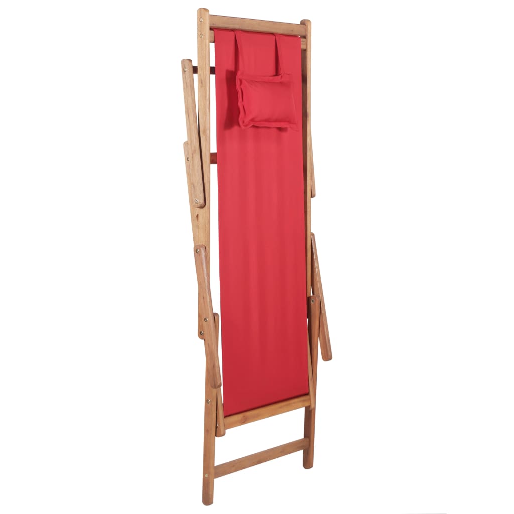Folding beach chair with a red fabric seat and sturdy wooden frame, ideal for camping and leisure activities.