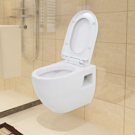 Wall-hung ceramic toilet in white with soft-close lid, modern design, mounted on tiled bathroom wall.