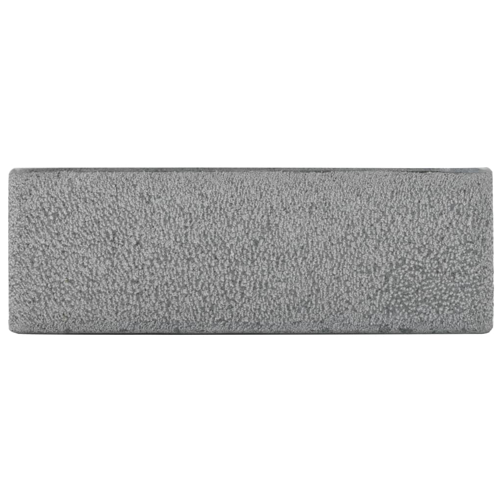 Soft grey rectangular towel with textured surface for bathroom or home use, ideal for adding comfort and style.