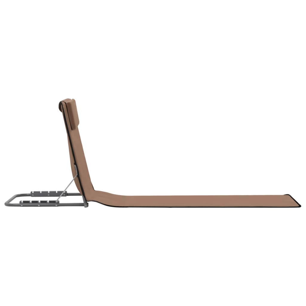 Folding beach mat with adjustable backrest and headrest, ideal for relaxing outdoors.
