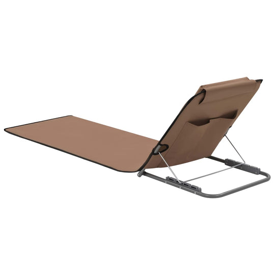Folding beach mat in brown with backrest and storage pocket for easy relaxation outdoors.
