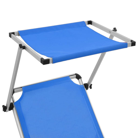 Folding sun lounger with adjustable blue roof and lightweight aluminum frame for comfortable outdoor relaxation.