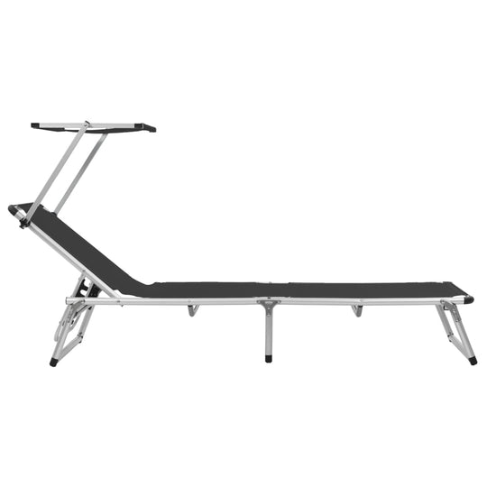 Folding sun lounger with adjustable roof, lightweight aluminium frame, and durable textilene for ultimate comfort.