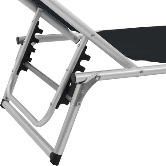 Folding sun lounger with adjustable backrest and aluminium frame for ultimate comfort and easy transport.