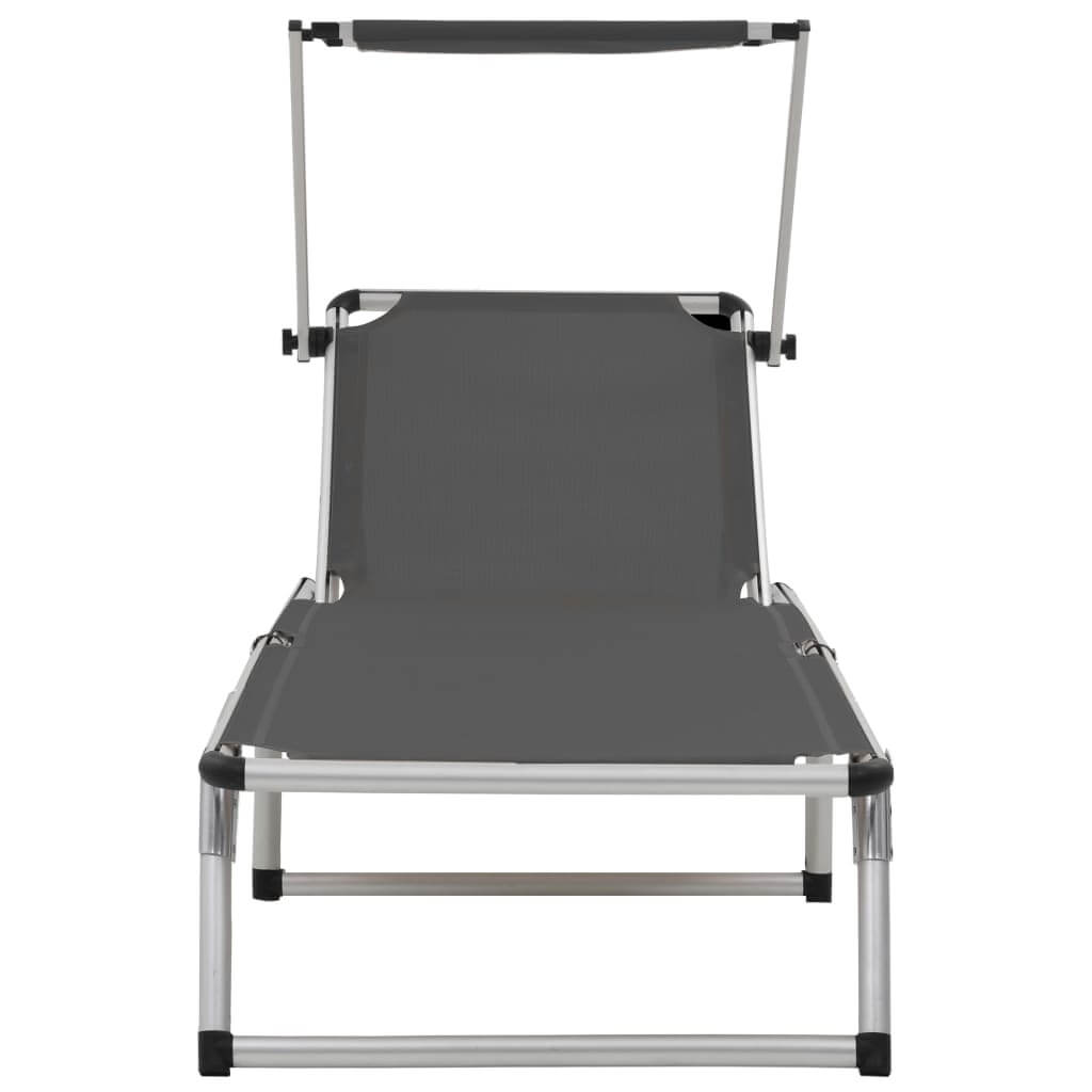 Folding sun lounger with adjustable roof, aluminium frame, and textilene fabric for comfort and portability.