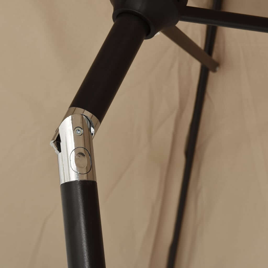 Close-up of metal pole joint of outdoor parasol showcasing durable construction and easy assembly features.