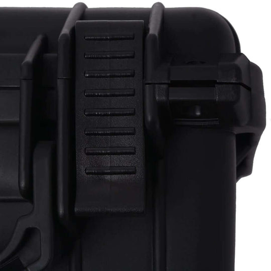 Close-up of the durable locking mechanism on a lightweight protective black equipment case.