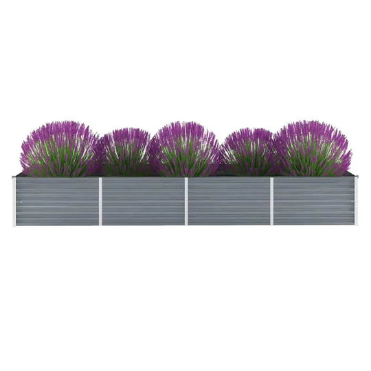 Galvanised steel garden raised bed with purple flowers, perfect for outdoor decor and plant growth.