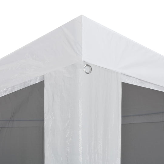 Corner detail of a durable party tent with mesh sidewalls, showcasing heavy-duty materials and grommet for secure anchoring.