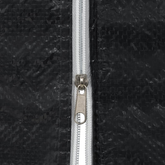 Close-up of a zipper on a black PE party tent sidewall, highlighting durability and easy access.