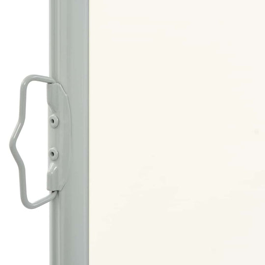 Close-up of the handle and sturdy frame of a cream retractable awning for outdoor furniture and patios.