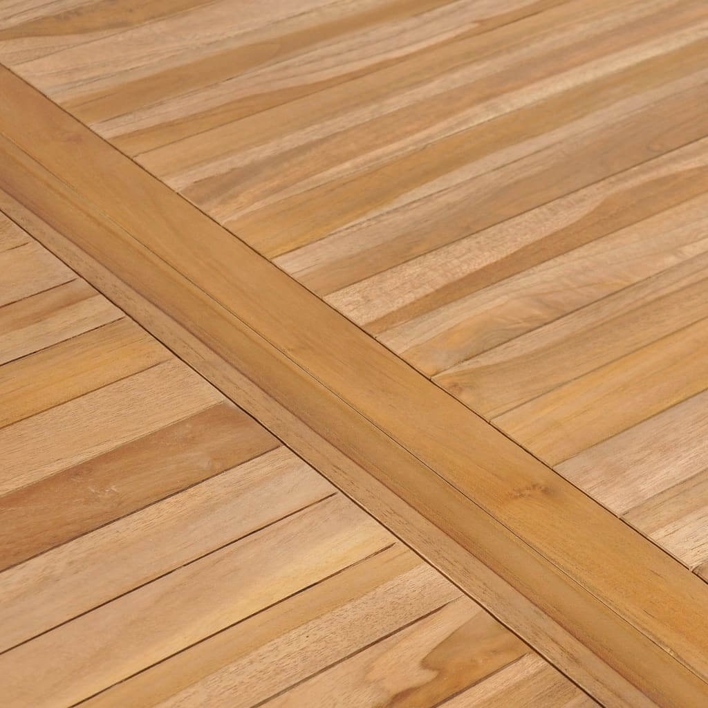 Close-up of solid teak wood surface, showcasing the smooth finish and natural grain patterns for outdoor furniture.