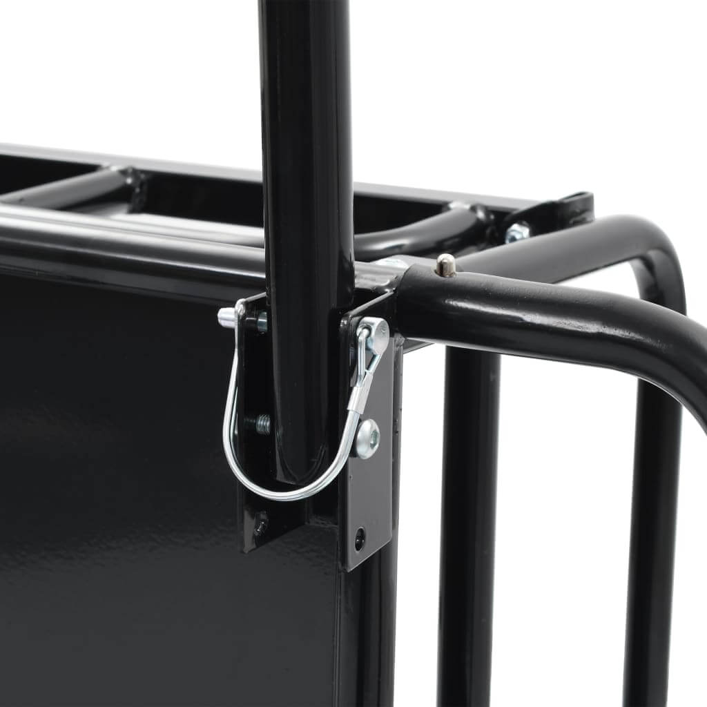 Close-up of the heavy-duty steel frame with quick-release hitch of a bike trailer for easy attachment.