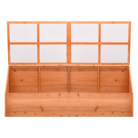 Wooden greenhouse with hinged lid and PC board sections, ideal for planting herbs and flowers in outdoor areas.