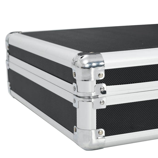 Close-up of a sturdy black aluminium gun case with durable ABS exterior and silver metal corners, showcasing high-quality construction.