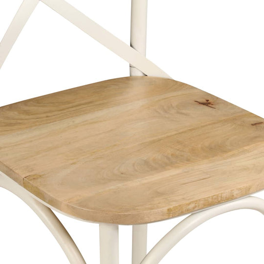 Close-up of solid mango wood seat of Cross Chairs with white steel frame, perfect for stylish outdoor furniture.